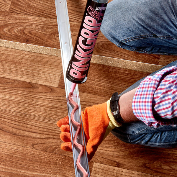 This image displays the Everbuild Pinkgrip Adhesive Solvent Based - Bonding Metal
