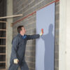 This image displays the Everbuild Pinkgrip Dryfix FR – 750ml Applied to Wall