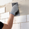 This image displays the Everbuild 701 Non-Slip Tile Adhesive – In Application