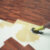 An image of 550 Everbuild Floor Adhesive being applied.