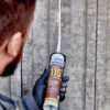 This image is the Everbuild Everflex 115 G.P Building Mastic In Application Externally