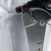 This image displays the Edma 0318 Hammer Tacker specifically completing an application on materials.